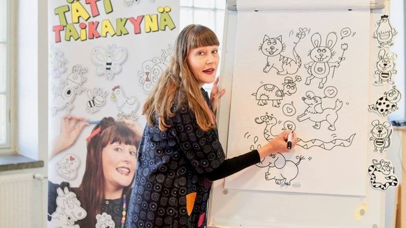 Nainen piirtää piirtolehtiöön.